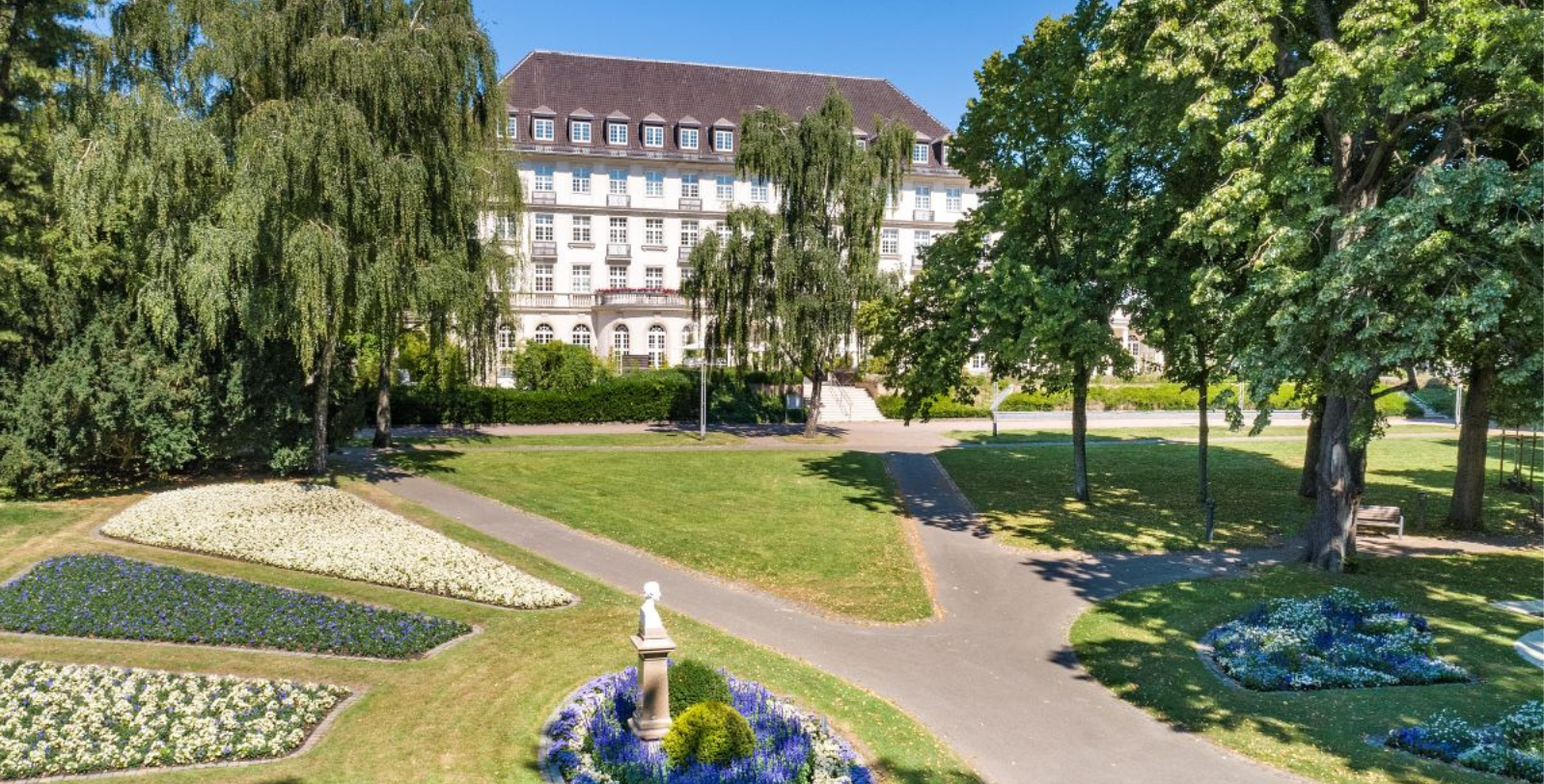 Discover the stunning Neoclassical façade that defines the Hotel Aachen Quellenhof.