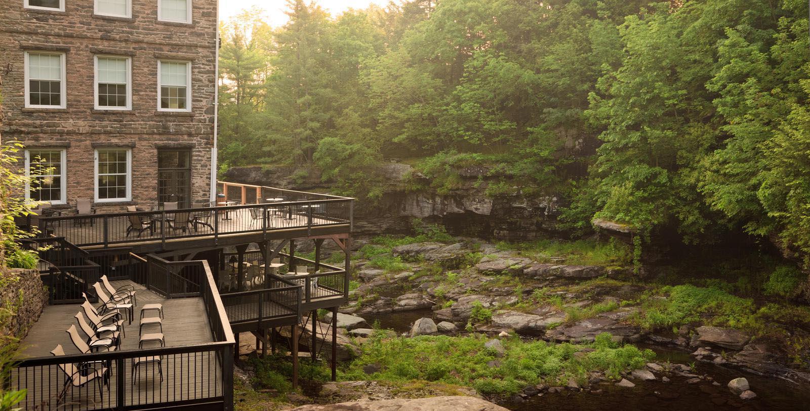 Image of Exterior & Wallenpaupauck Creek, Ledges Hotel in Hawley, Pennsylvania, 1890, Member of Historic Hotels of America, Overview