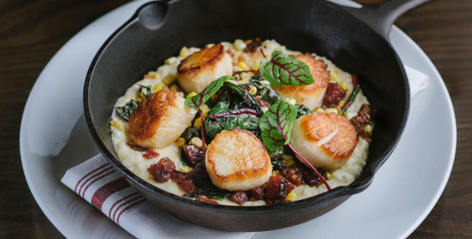 Taste the exceptional cuisine at the hotel's restaurant, OAK Long Bar + Kitchen.