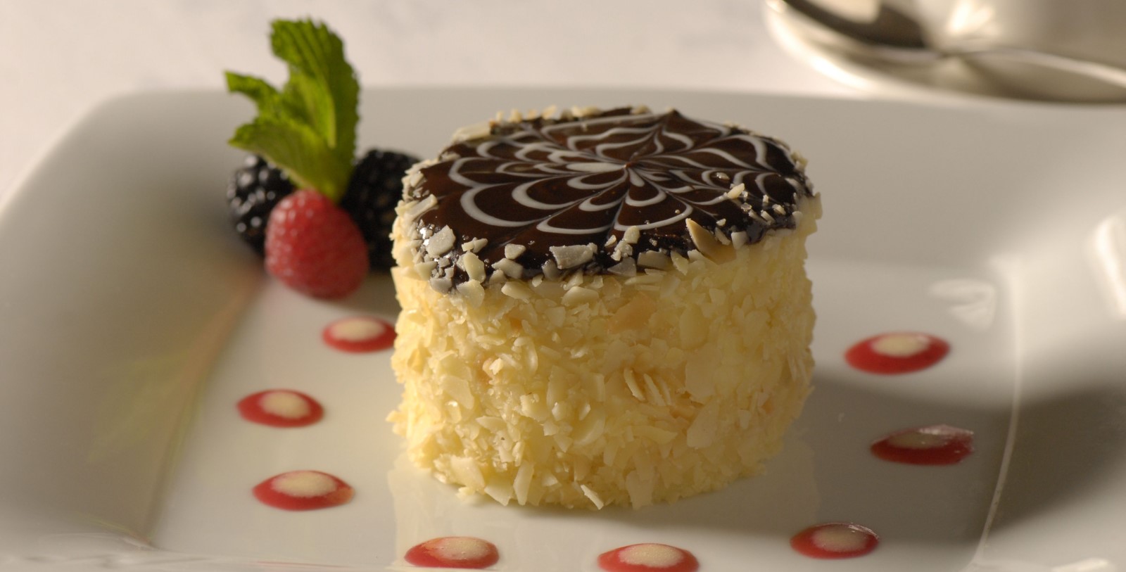 Taste the signature Boston Cream Pie and the soft, buttery Parker House Rolls of Parker’s Restaurant inside the Omni Parker House, Boston.