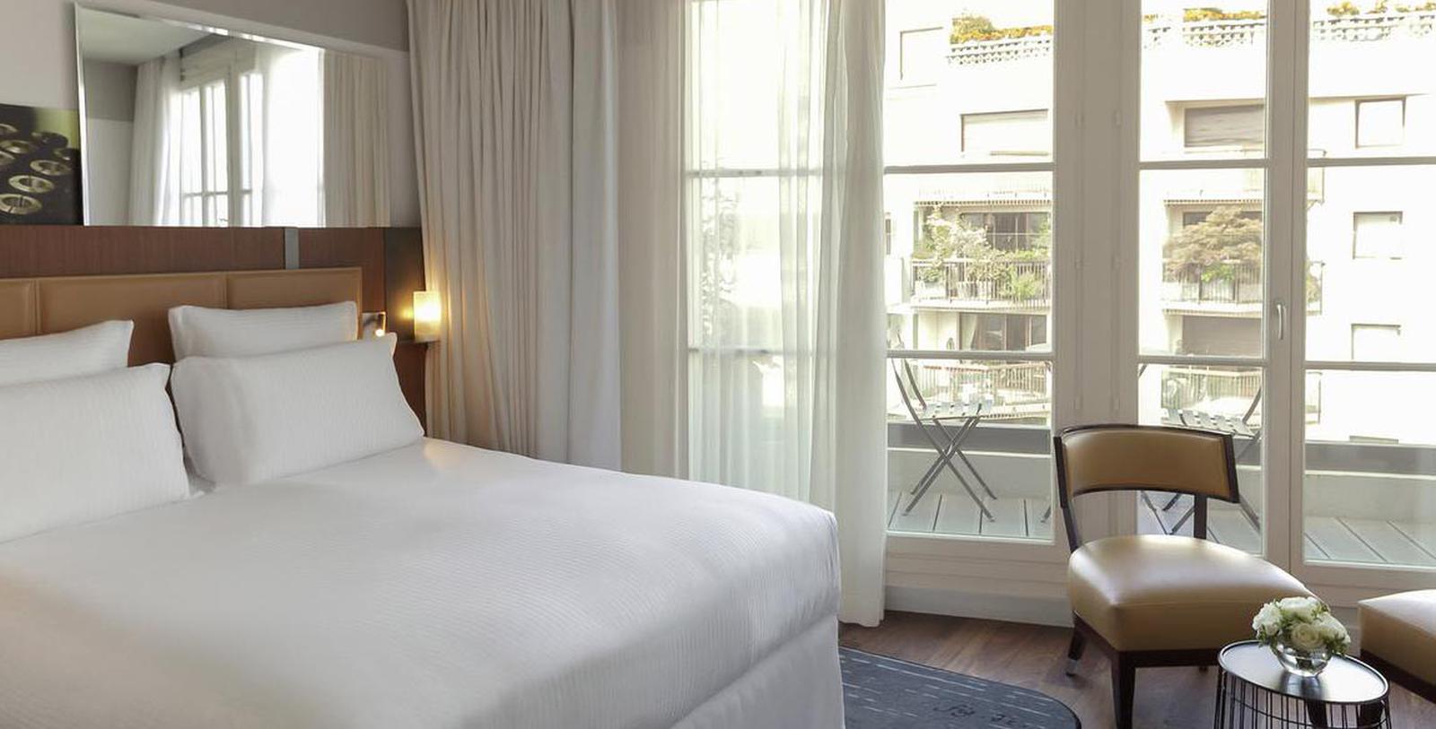 Image of Guestroom Interior with Balcony Hôtel Paris Bastille Boutet - MGallery by Sofitel, 1929, Member of Historic Hotels Worldwide, in Paris, France, Hot Deals