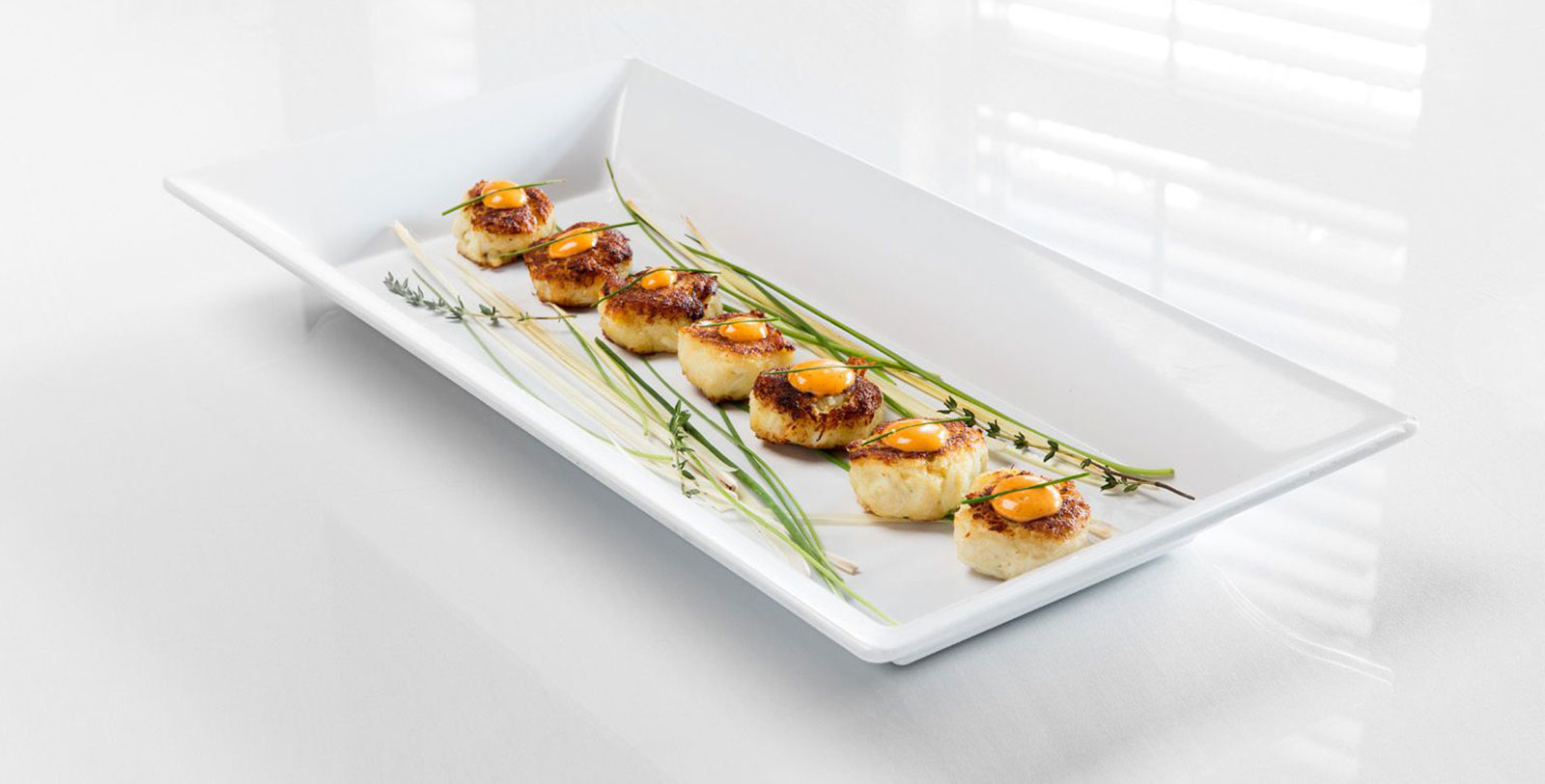 Image of Crab Cakes at Swamp Fox Restaurant at Francis Marion Hotel, 1924, Member of Historic Hotels of America, in Charleston, South Carolina, Taste