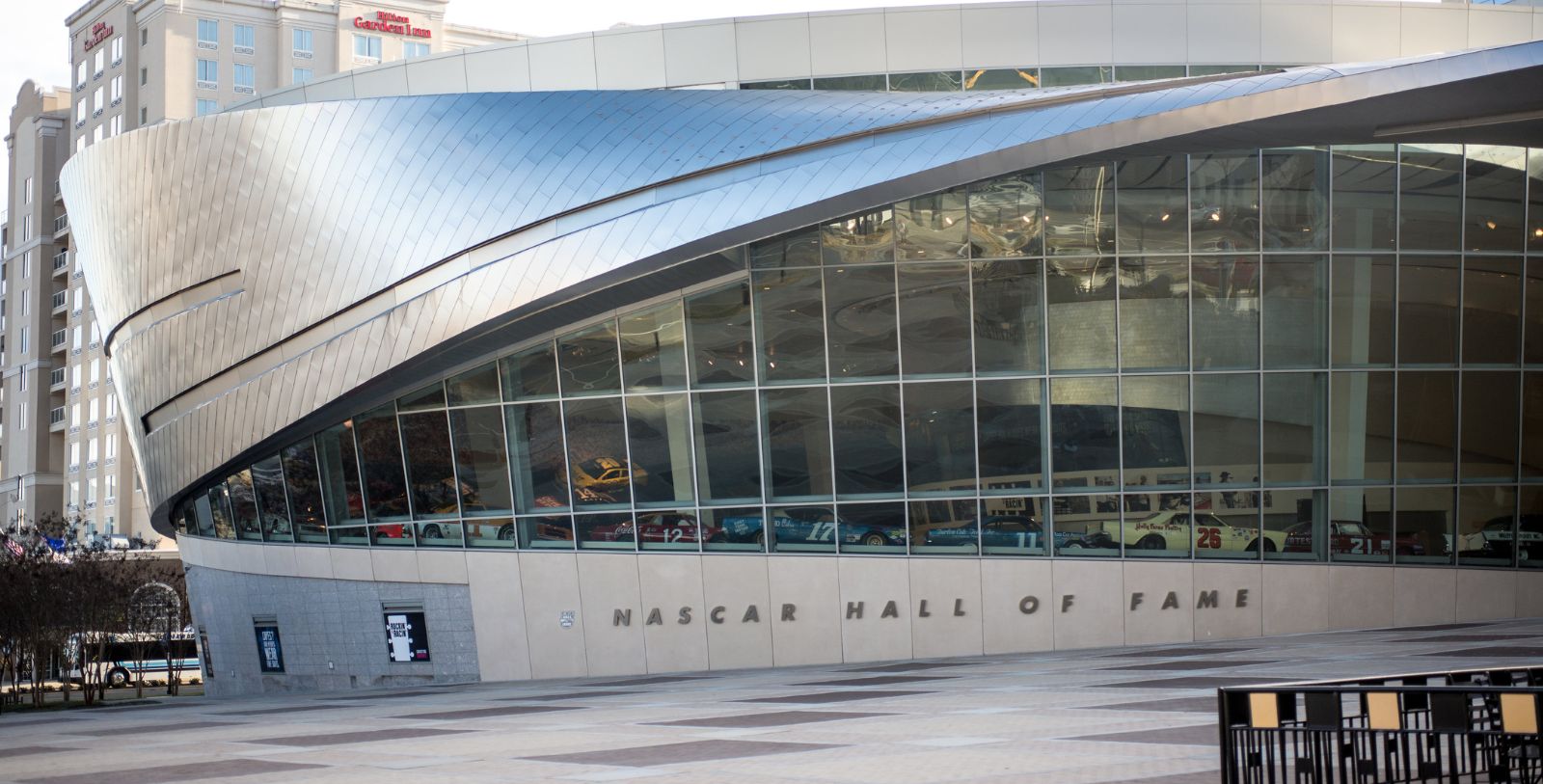 Explore the NASCAR Hall of Fame, honoring legends of racing—cars, drivers, crew chiefs, owners, and broadcasters.