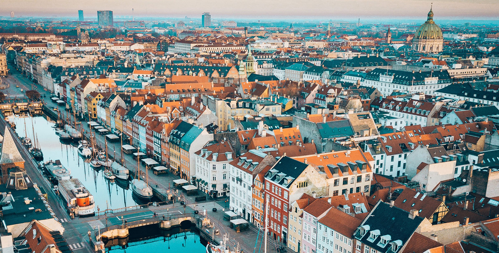 Visit the grounds of Rosenborg Castle, a beautiful Danish palace from the 17th century located in the center of Copenhagen.