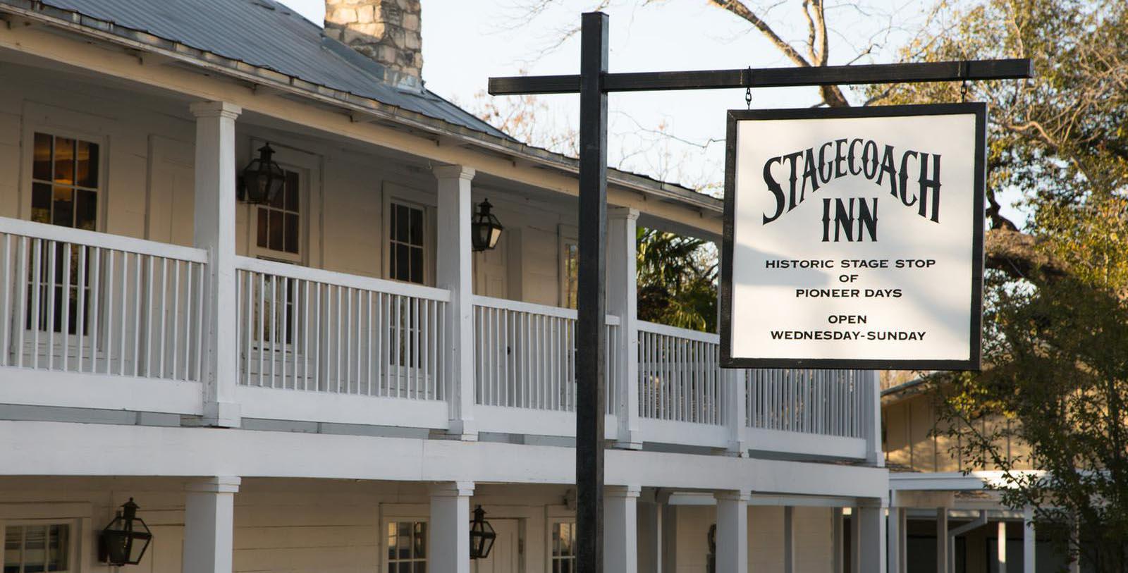 Image of Hotel Front Entrance and Hotel Sign at The Stagecoach Inn, 1852, Member of Historic Hotels of America, in Salado, Texas, Overview
