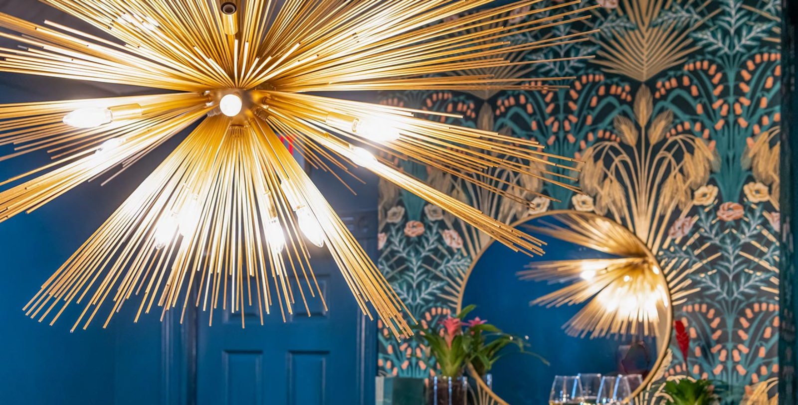 Image of the living room and sunburst chandelier at The Historic Magnolia House, 1889, a member of Historic Hotels of America, Greensboro, North Carolina