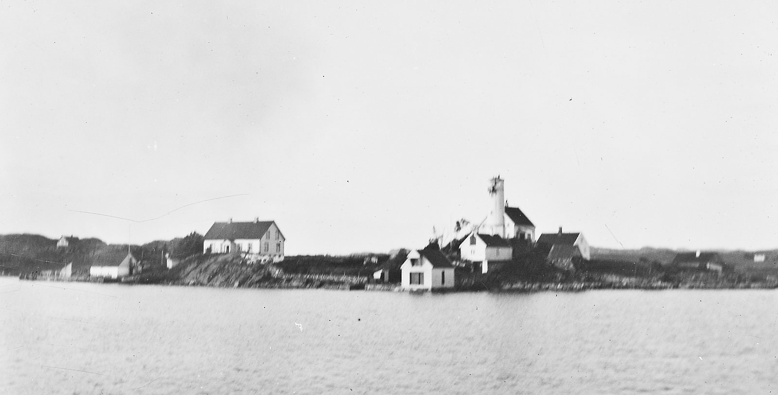 Image of Historic Exterior and Coastline, Høyevarde Fyrhotell, 1700, Member of Historic Hotels Worldwide, in Havik, Norway, History