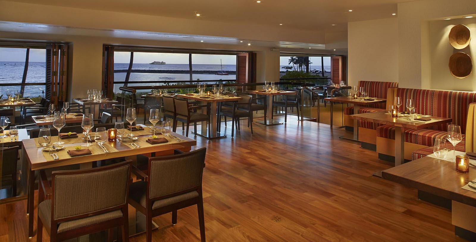 Taste the iconic Blue Hawaii Cocktail in the Tropics Bar & Grill of this historic resort.