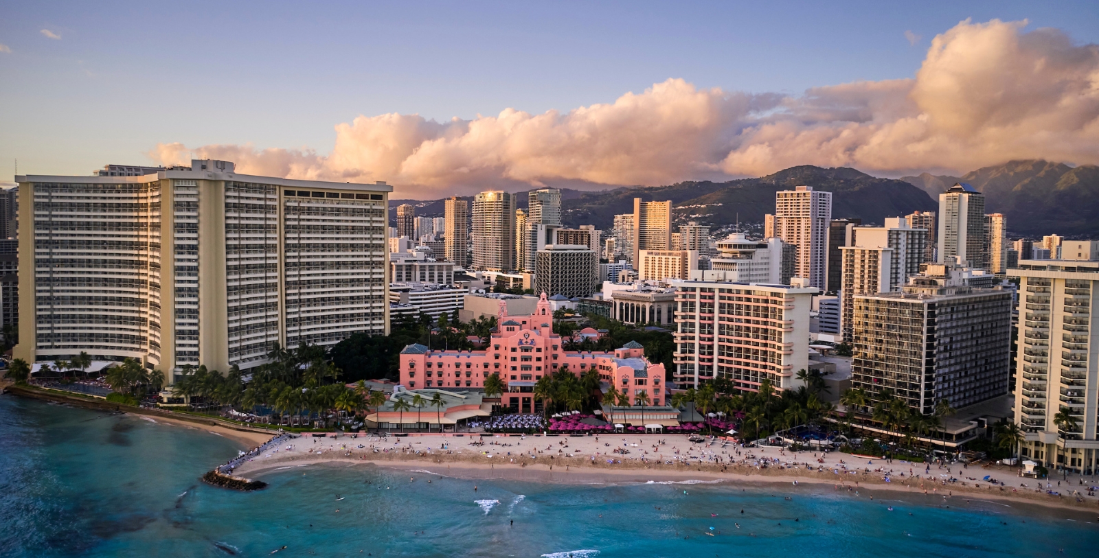 Discover the International Market Place, the Waikiki Beach Walk, and the Royal Hawaiian Shopping Center from “The Pink Palace of the Pacific.”