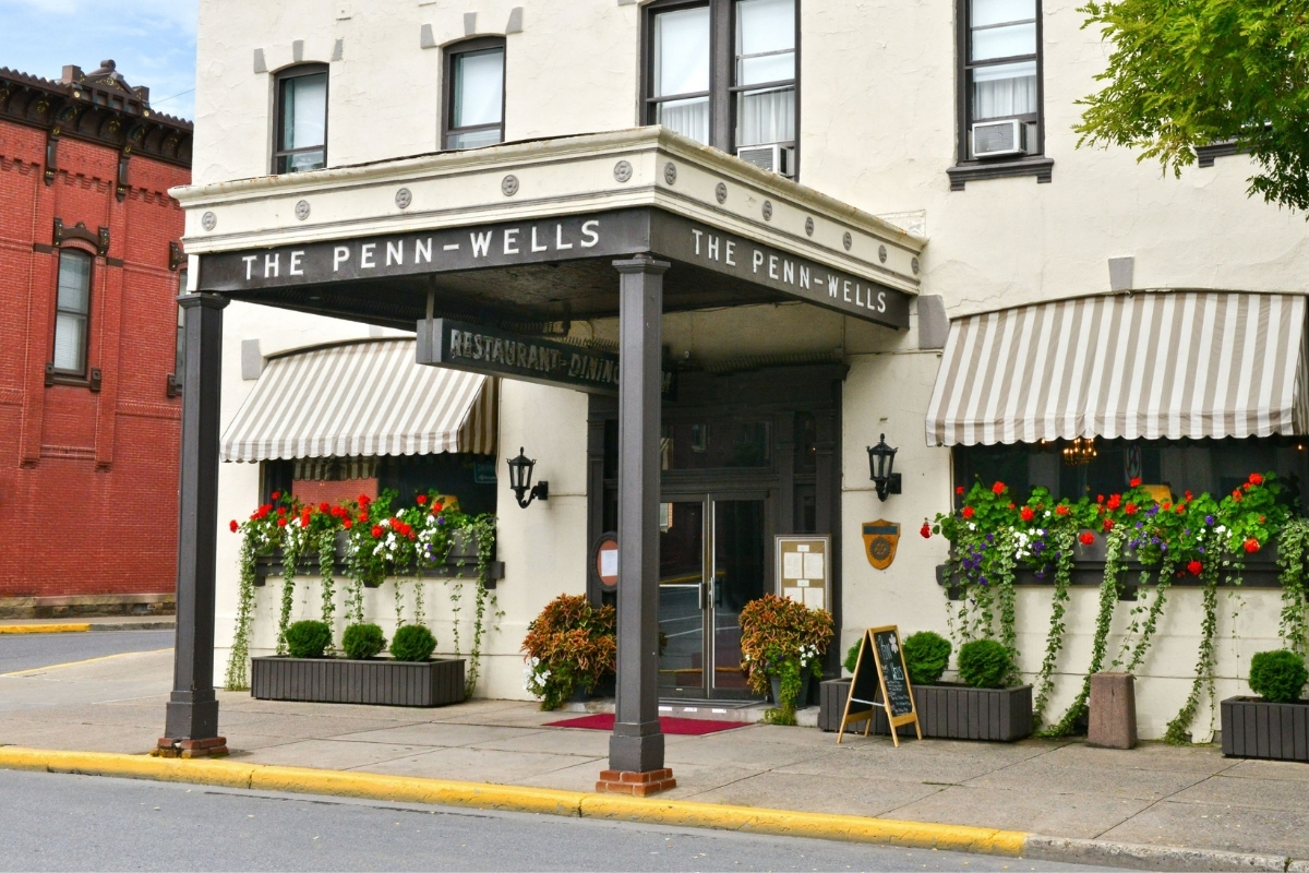 Image of Entrance of Penn Wells Hotel, 1869, Member of Historic Hotels of America, in Wellsboro, Pennsylvania, Special Offers, Discounted Rates, Families, Romantic Escape, Honeymoons, Anniversaries, Reunions