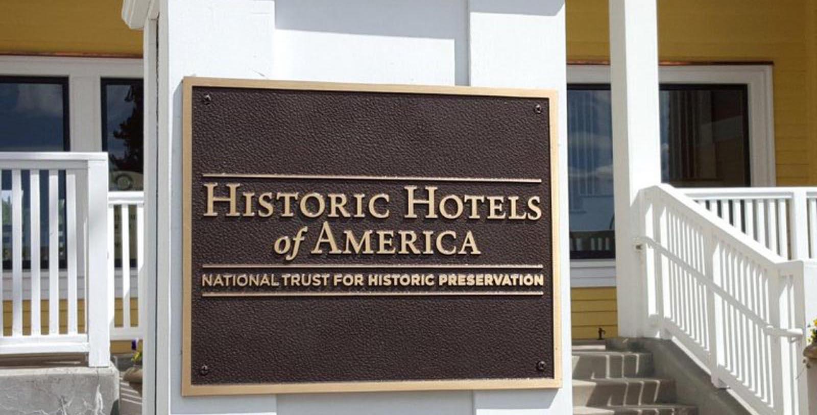 Discover the Colonial Revival-style architecture of the Lake Yellowstone Hotel & Cabins.