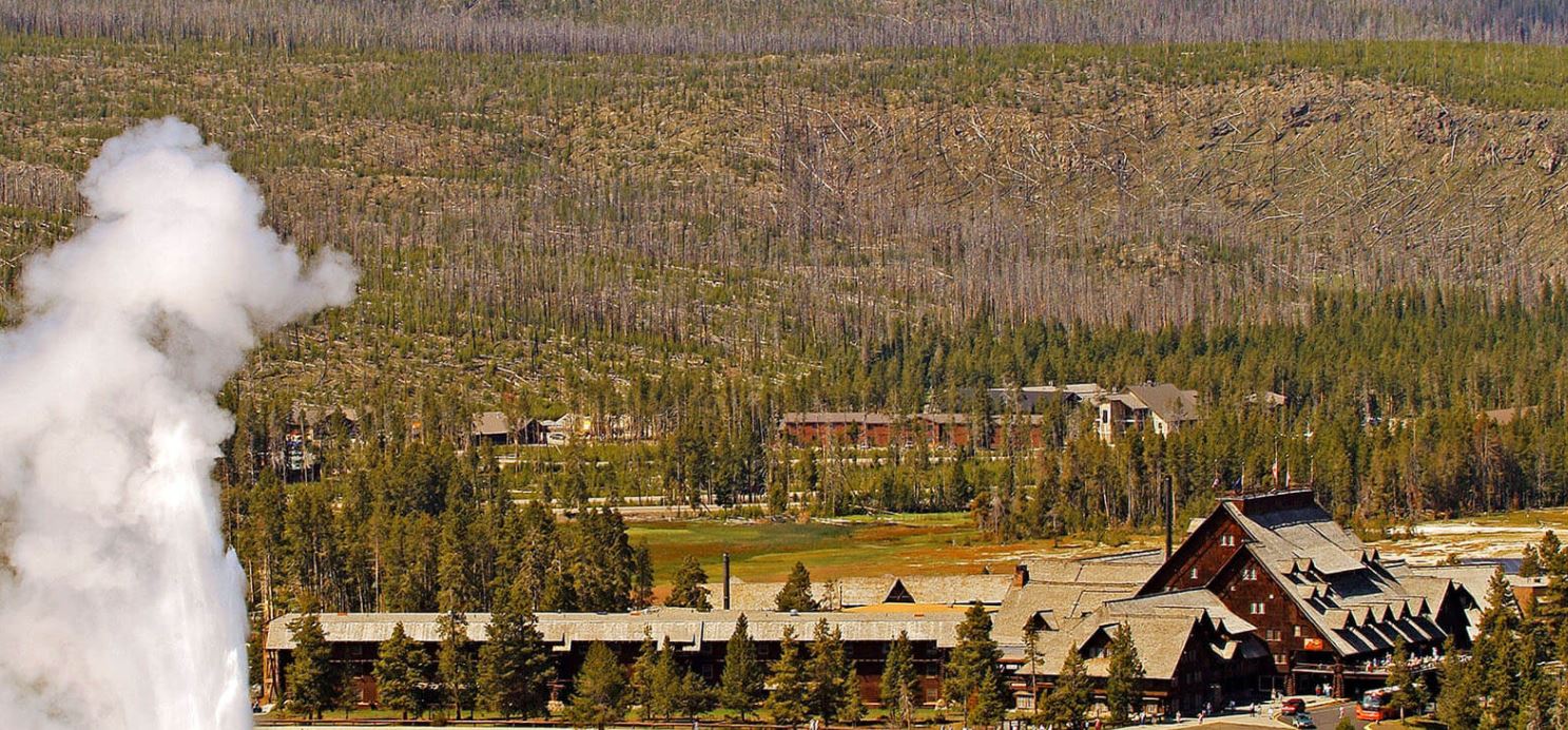 Experience Old Faithful, the Yellowstone Caldera, and the Grand Prismatic Spring in the surrounding Yellowstone National Park.