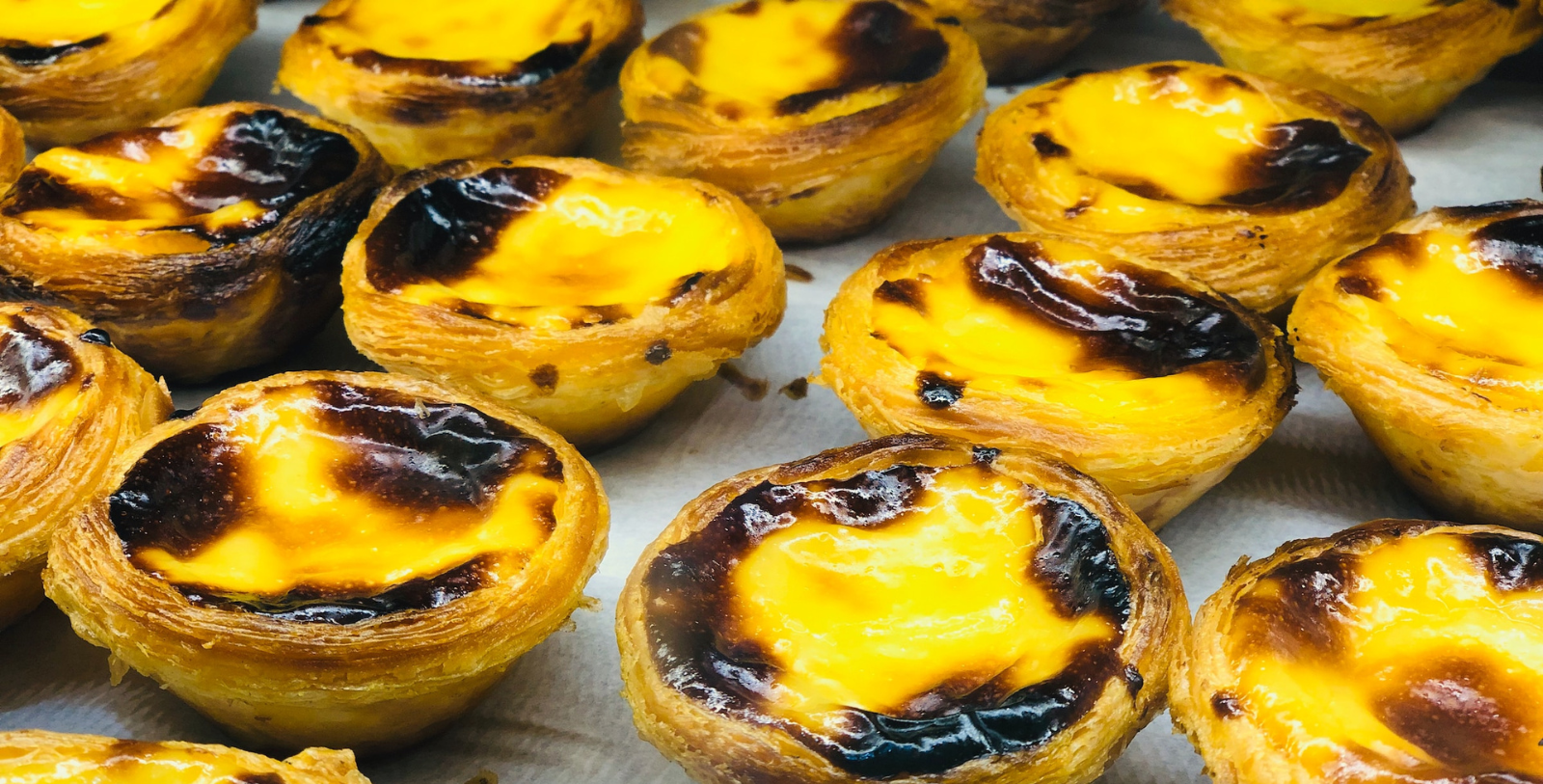 Taste Lisbon’s delicious culinary traditions, from ocean-fresh seafood like bacalhau, a meal of salted cod considered the city’s unofficial dish, and tinned conservas to pastéis de nata, a sweet, custard-filled egg tart.