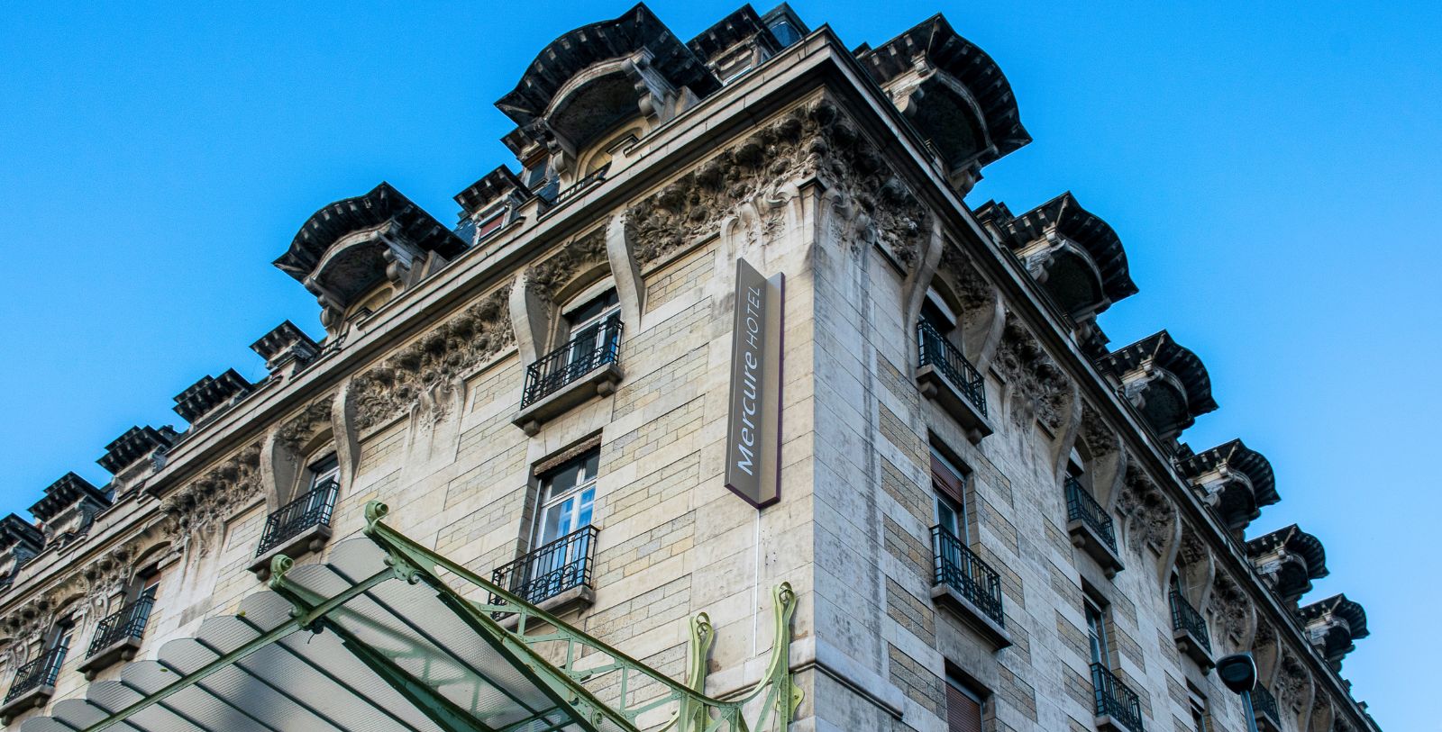 Discover the stunning Art Nouveau architecture of Mercure Lyon Centre Château Perrache.
