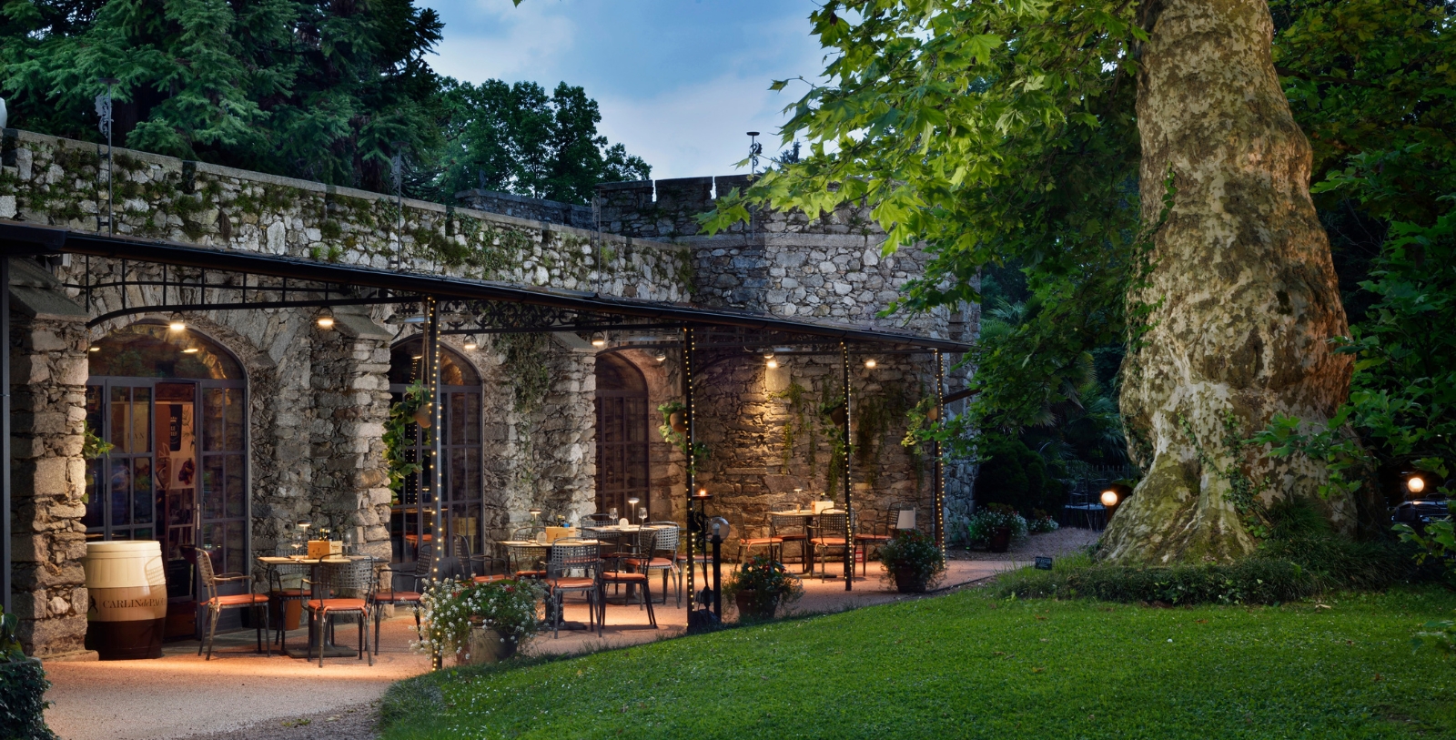 Discover the extensive estate at Castello Dal Pozzo Resort Lago Maggiore, including its lush gardens and luxurious pool.