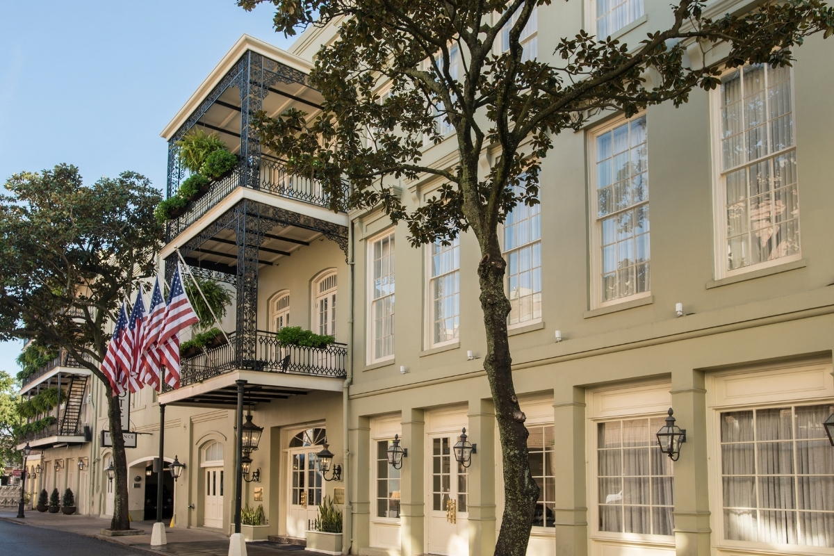 Image of hotel exterior and entryway at Bienville House, 1835, Member of Historic Hotels of America, in New Orleans, Louisiana, Special Offers, Discounted Rates, Families, Romantic Escape, Honeymoons, Anniversaries, Reunions