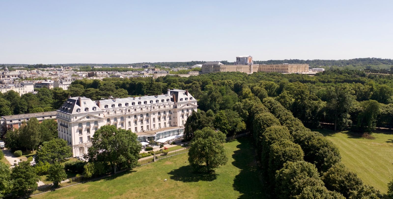 Image of hotel exterior at Waldorf Astoria Versailles- Trianon Palace, 1910, a Member of Historic Hotels Worldwide in Versailles, France.