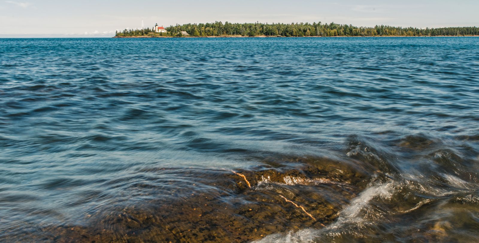 Experience the beauty of Lake Michigan with its crystalline waters.