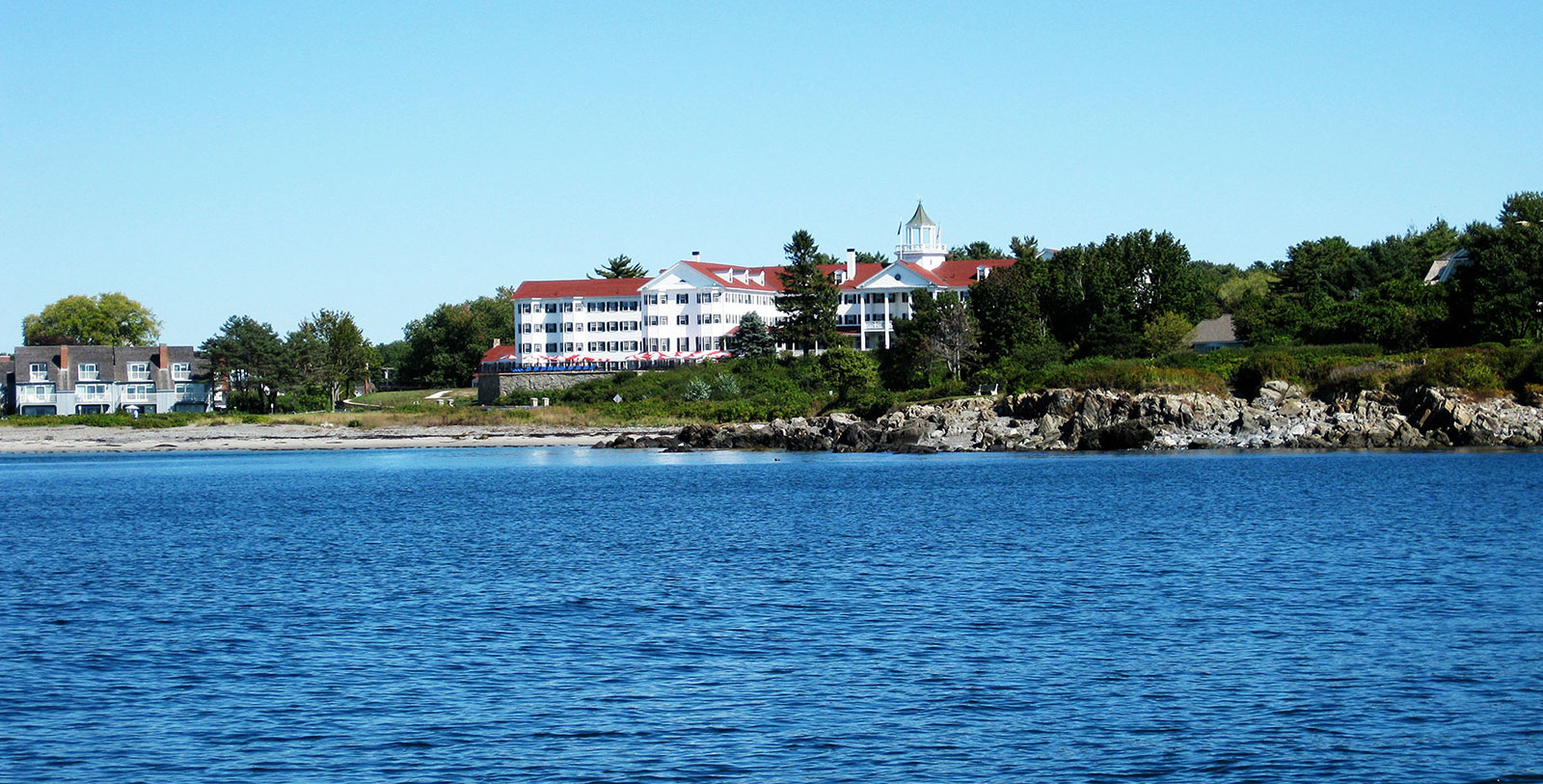 Image of Hotel Exterior with Beach The Colony Hotel, 1914, Member of Historic Hotels of America, in Kennebunkport, Maine, Overview