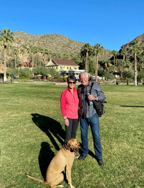 Cindy_and_Mike_Watts_with_their_dog_Abbey.jpg