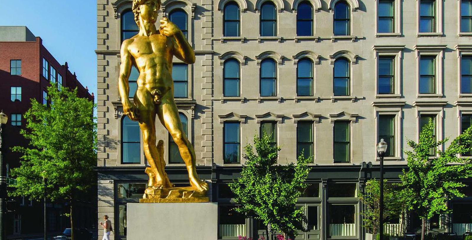 Discover the Romanesque façade of the 21c Museum Hotel Louisville.