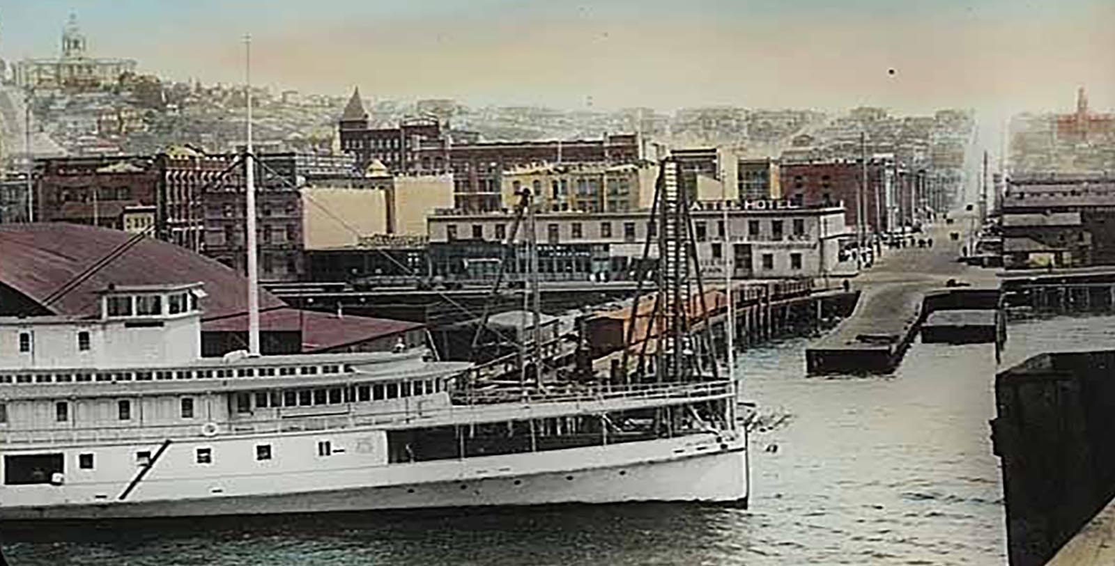 Discover how regrading leveled Denny Hill, allowing hotels, such as the Hotel Ändra (formerly Claremont Hotel), to be built in 1926 on flat ground.