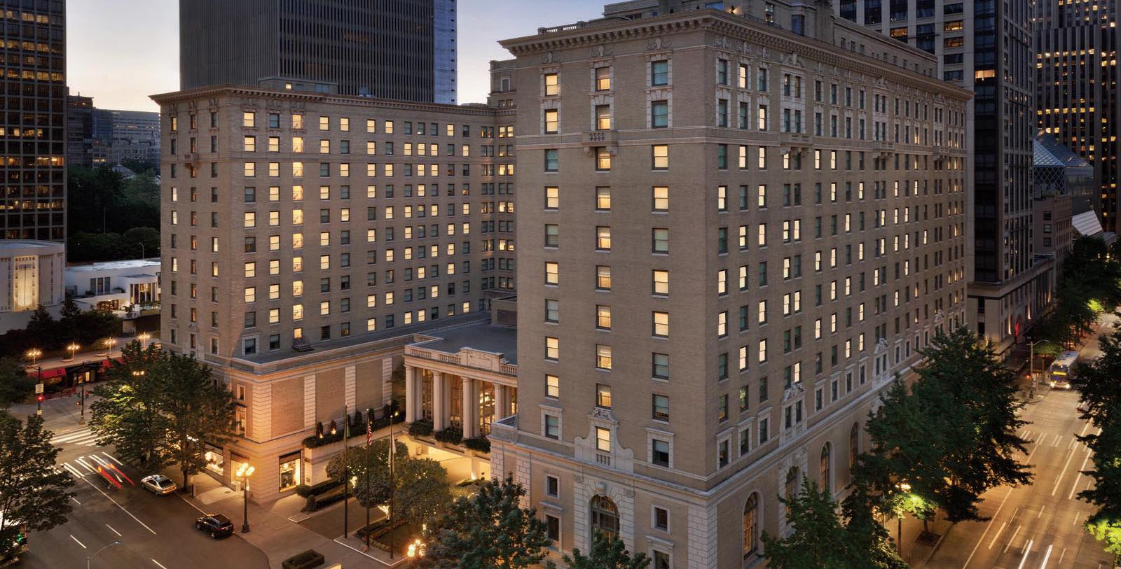 Image of hotel exterior at night Fairmont Olympic Hotel, 1924, Member of Historic Hotels of America, in Seattle, Washington, Special Offers, Discounted Rates, Families, Romantic Escape, Honeymoons, Anniversaries, Reunions