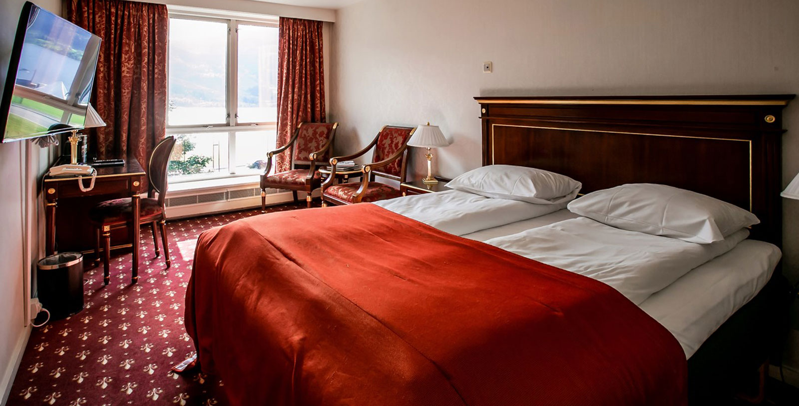 Image of Hotel Exterior and Guestroom Interior Fleischer's Hotel, 1864, Member of Historic Hotels Worldwide, in Voss, Norway, Accommodations