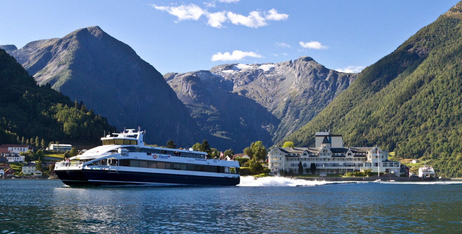 Image of Aerial View of Hotel with Mountains Kviknes Hotel, 1752, Member of Historic Hotels Worldwide, in Balestrand, Norway, Explore