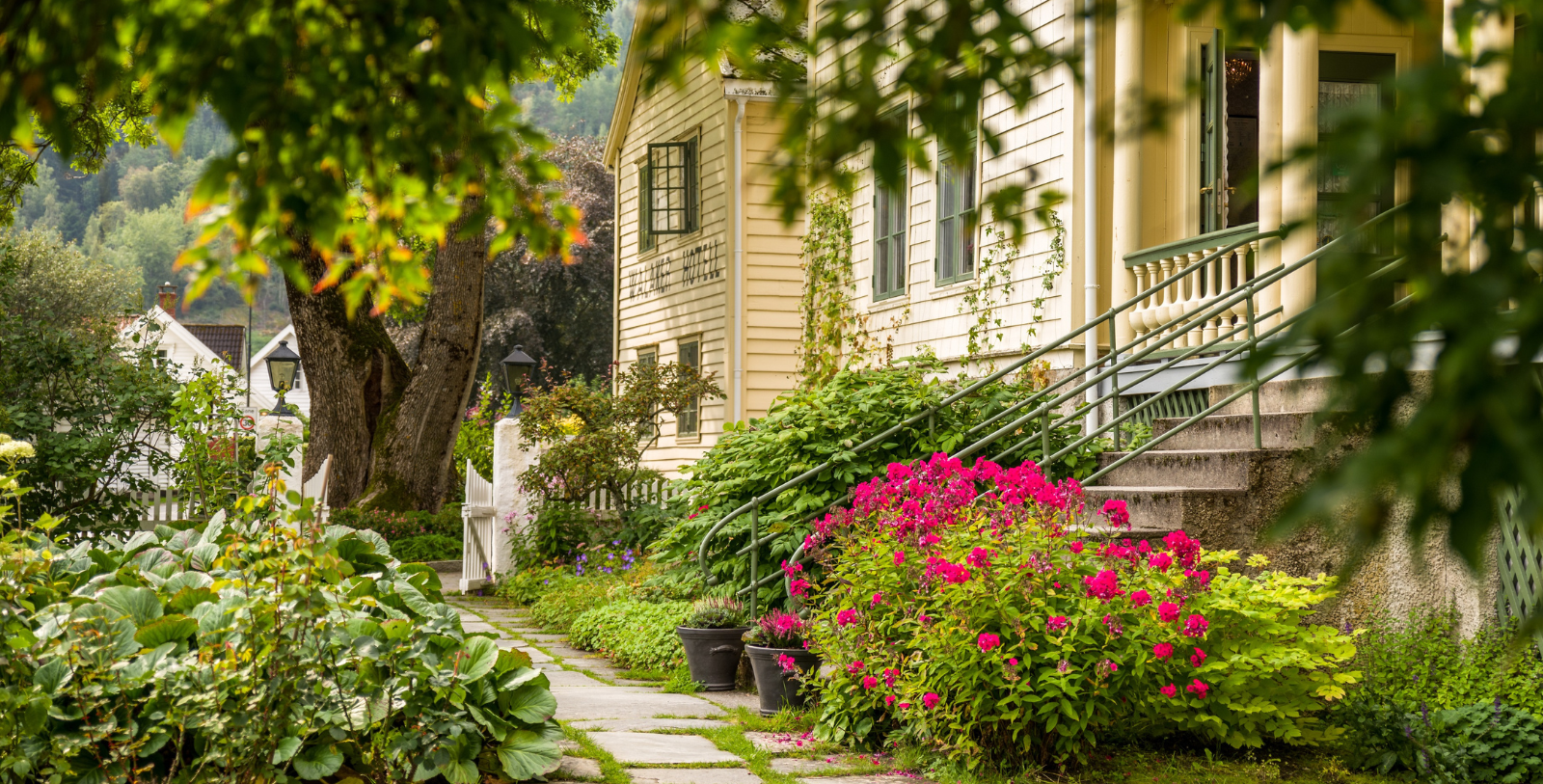 Image of garden of Walaker Hotell, 1640, Member of Historic Hotels Worldwide since 2023, in Solvorn, Norway
