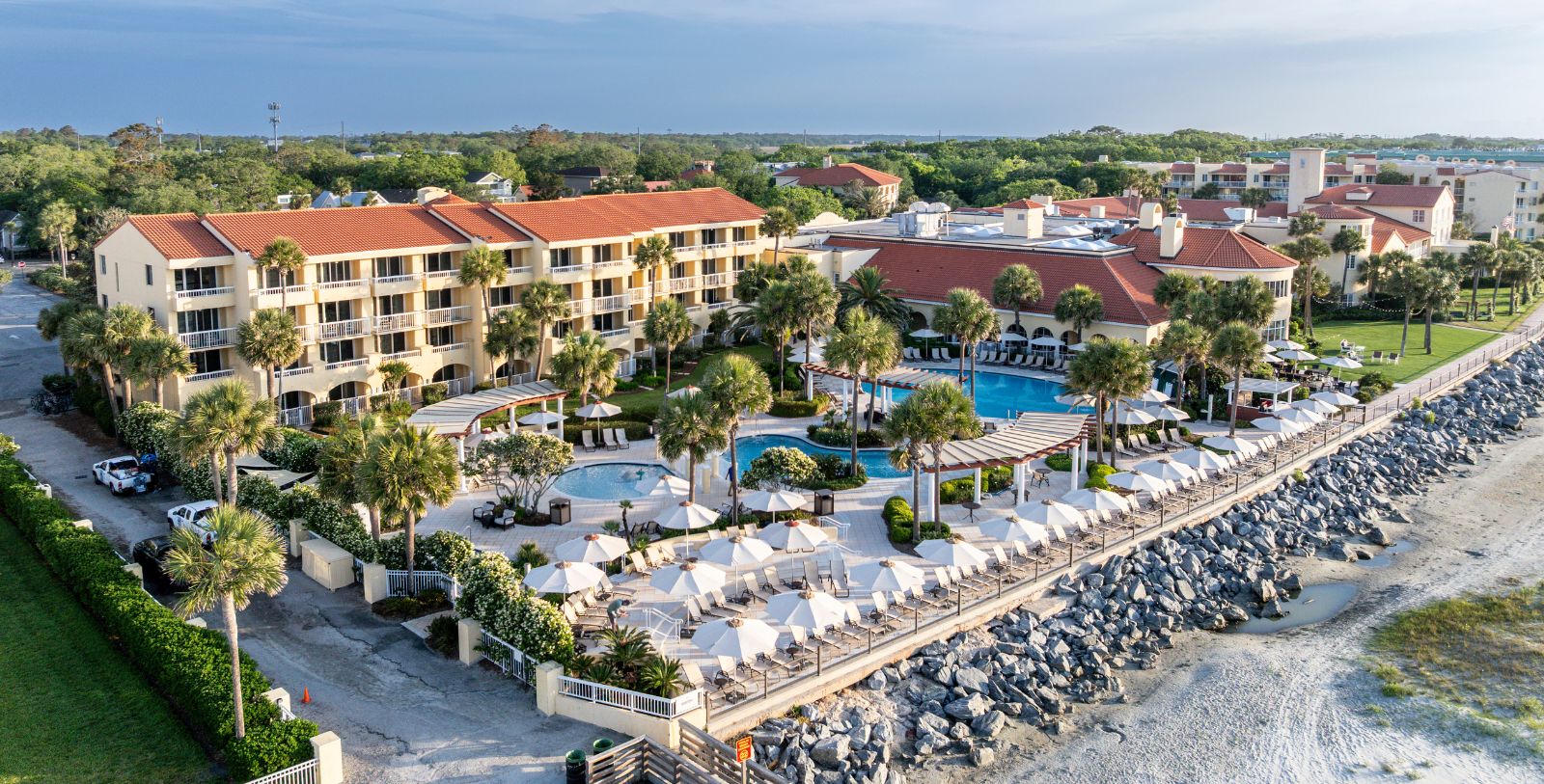 Image of Hotel Exterior The King and Prince Beach and Golf Resort, 1935, Member of Historic Hotels of America, on St. Simons Island, Georgia, Special Offers, Discounted Rates, Families, Romantic Escape, Honeymoons, Anniversaries, Reunions