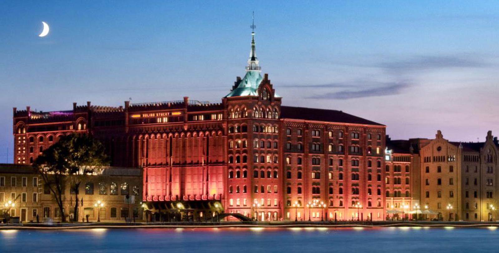 Image of Exterior at Night, Hilton Molino Stucky Venice, Italy, 1884, Member of Historic Hotels Worldwide, Special Offers, Discounted Rates, Families, Romantic Escape, Honeymoons, Anniversaries, Reunions