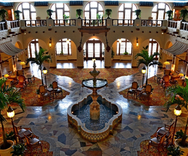 The Garden Court is crowned by a glass dome atrium and Austrian crystal chandeliers at the Palace Hotel in San Francisco.