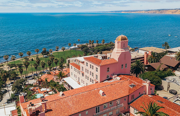 Dog with bowl in pet-friendly room at the Heathman Hotel in Portland, Oregon.