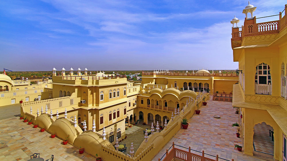 Daytime exterior of Alsisar Mahal in Rajasthan, India.