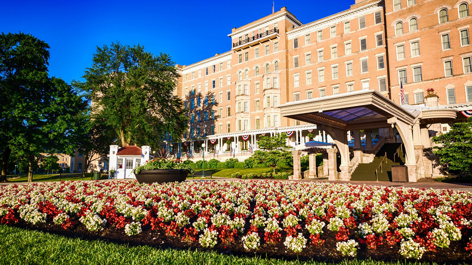 Daytime exterior with flowers at the French Lick Springs Hotel in Indiana.